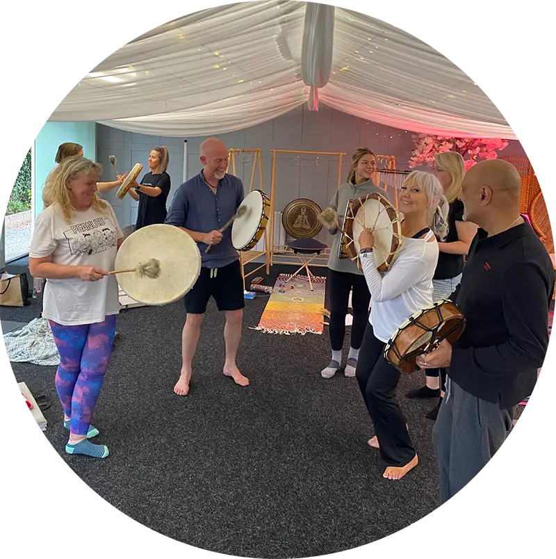 A drumming circle led by Neil