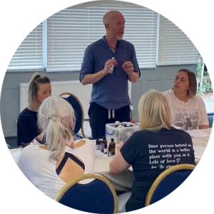 Neil Perry-Timson leading an aromatherapy workshop with community participants