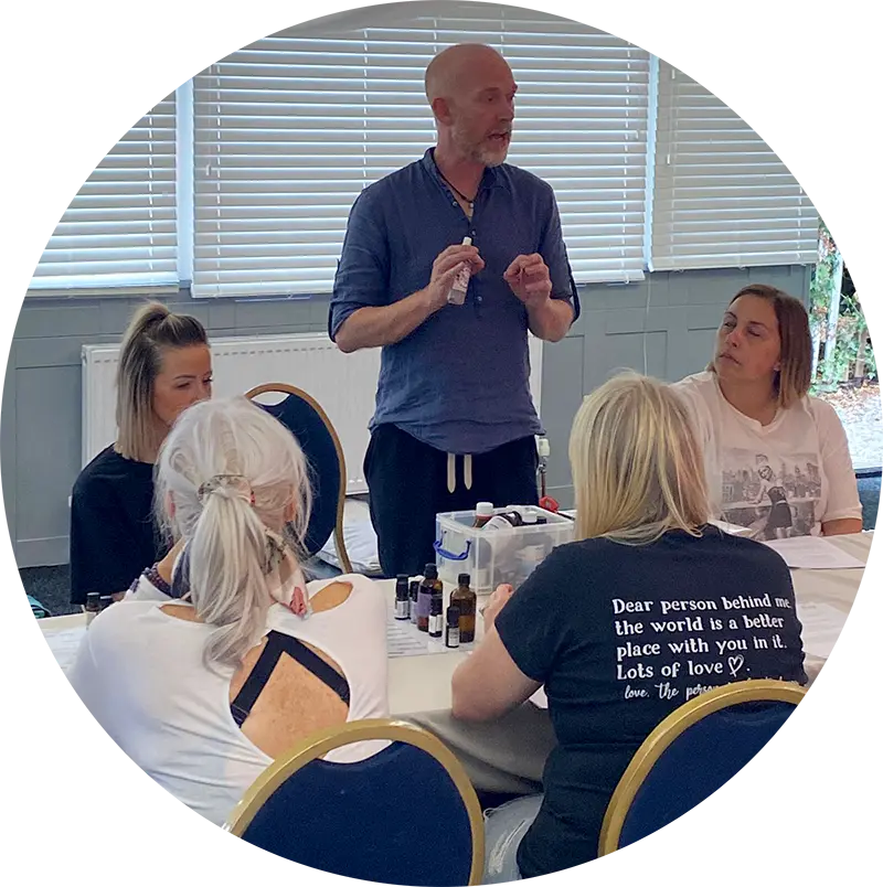 Neil Perry-Timson leading an aromatherapy workshop with community participants